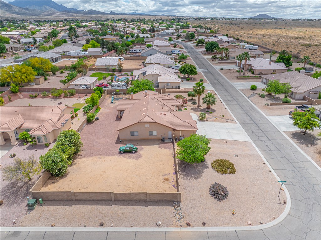 2940 Mountain Trail Road Kingman, AZ 86401 - Photo 44 of 53 an aerial view of a house with a yard