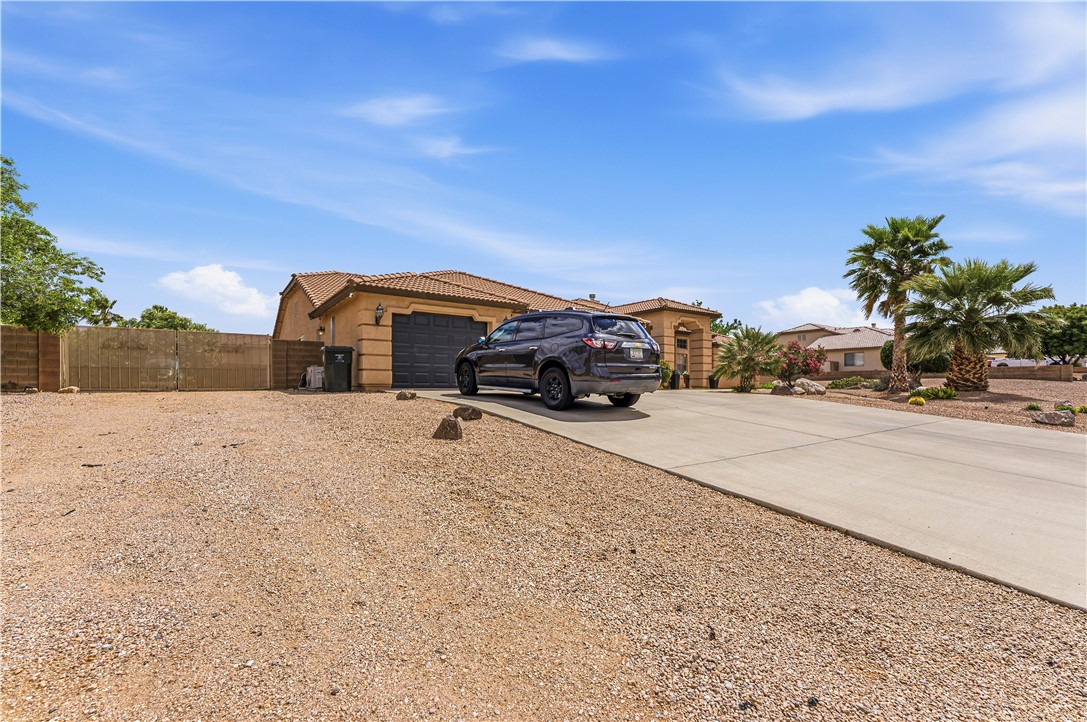 2940 Mountain Trail Road Kingman, AZ 86401 - Photo 49 of 53 a car parked on the side of the road