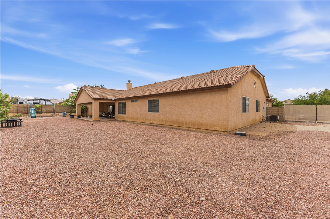 2940 Mountain Trail Road Kingman, AZ 86401 - Photo 51 of 53 a front view of a house with a yard