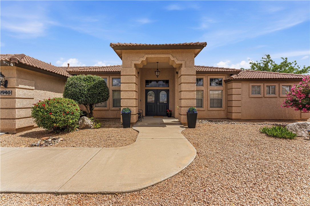 2940 Mountain Trail Road Kingman, AZ 86401 - Photo 52 of 53 a view of a house with potted plants