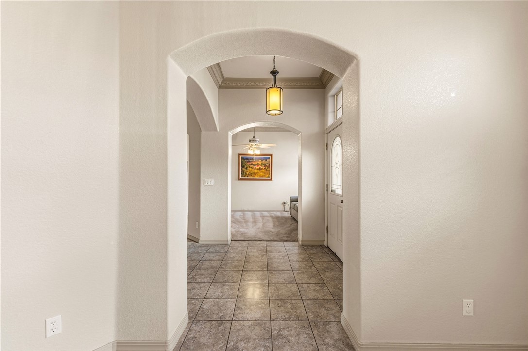 2940 Mountain Trail Road Kingman, AZ 86401 - Photo 8 of 53 a view of a livingroom from a hallway