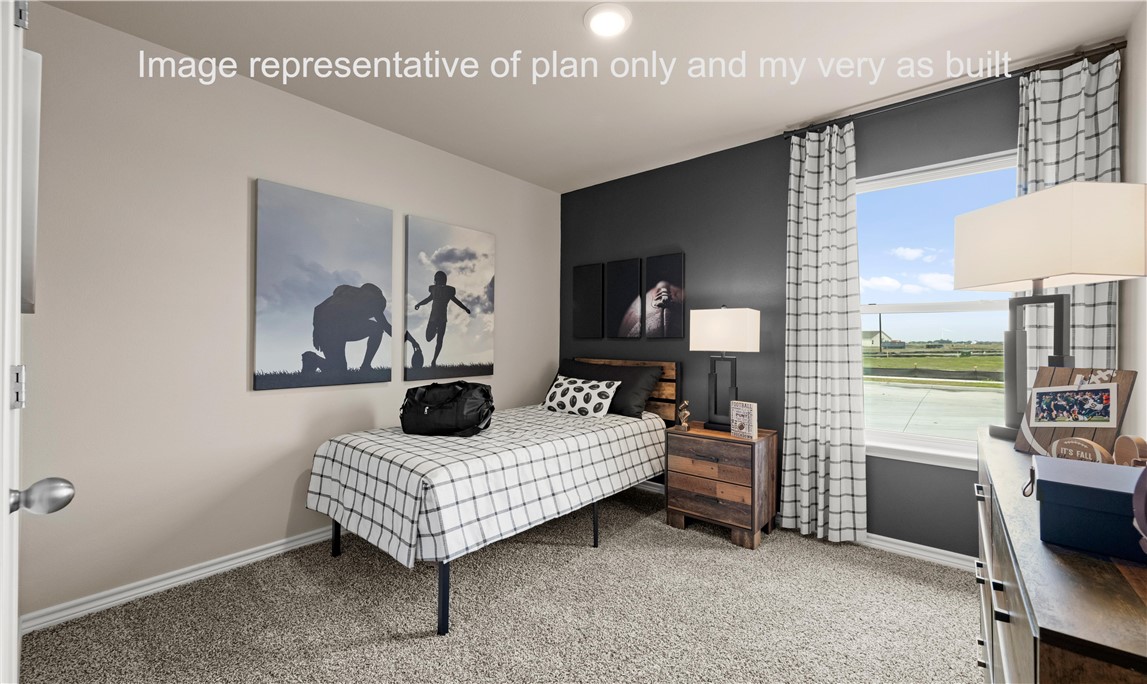 1503 Choctaw Road Sinton, TX 78387 - Photo 6 of 29 a bedroom with furniture and a window