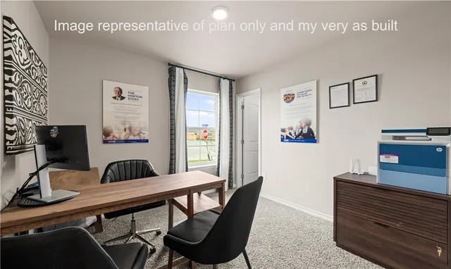 a view of a workspace with furniture