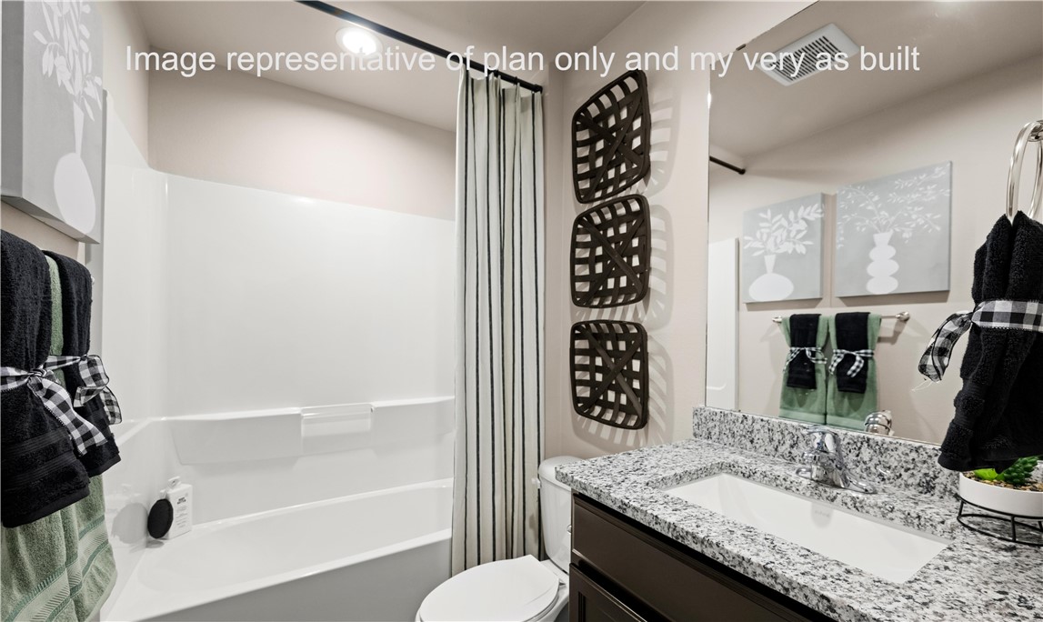 1503 Choctaw Road Sinton, TX 78387 - Photo 10 of 29 a bathroom with a granite countertop sink a toilet and shower