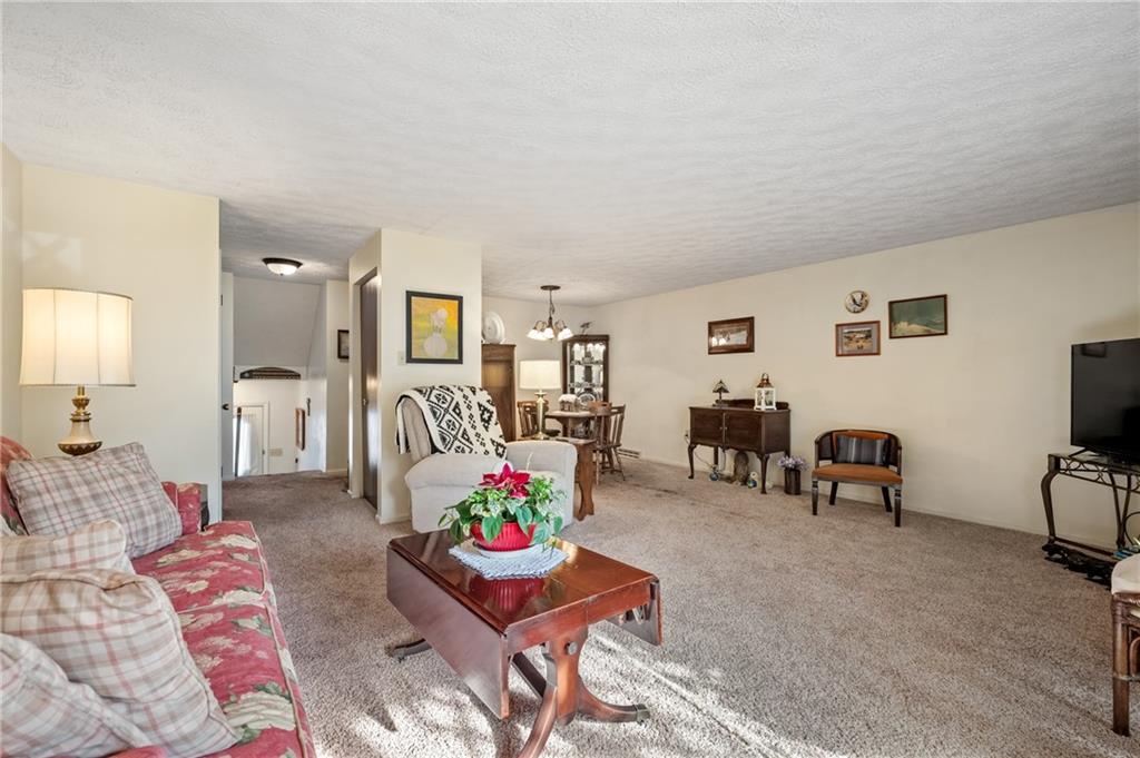 11 McKinley Square Coraopolis, PA 15108 - Photo 6 of 26 a bedroom with furniture and a bed