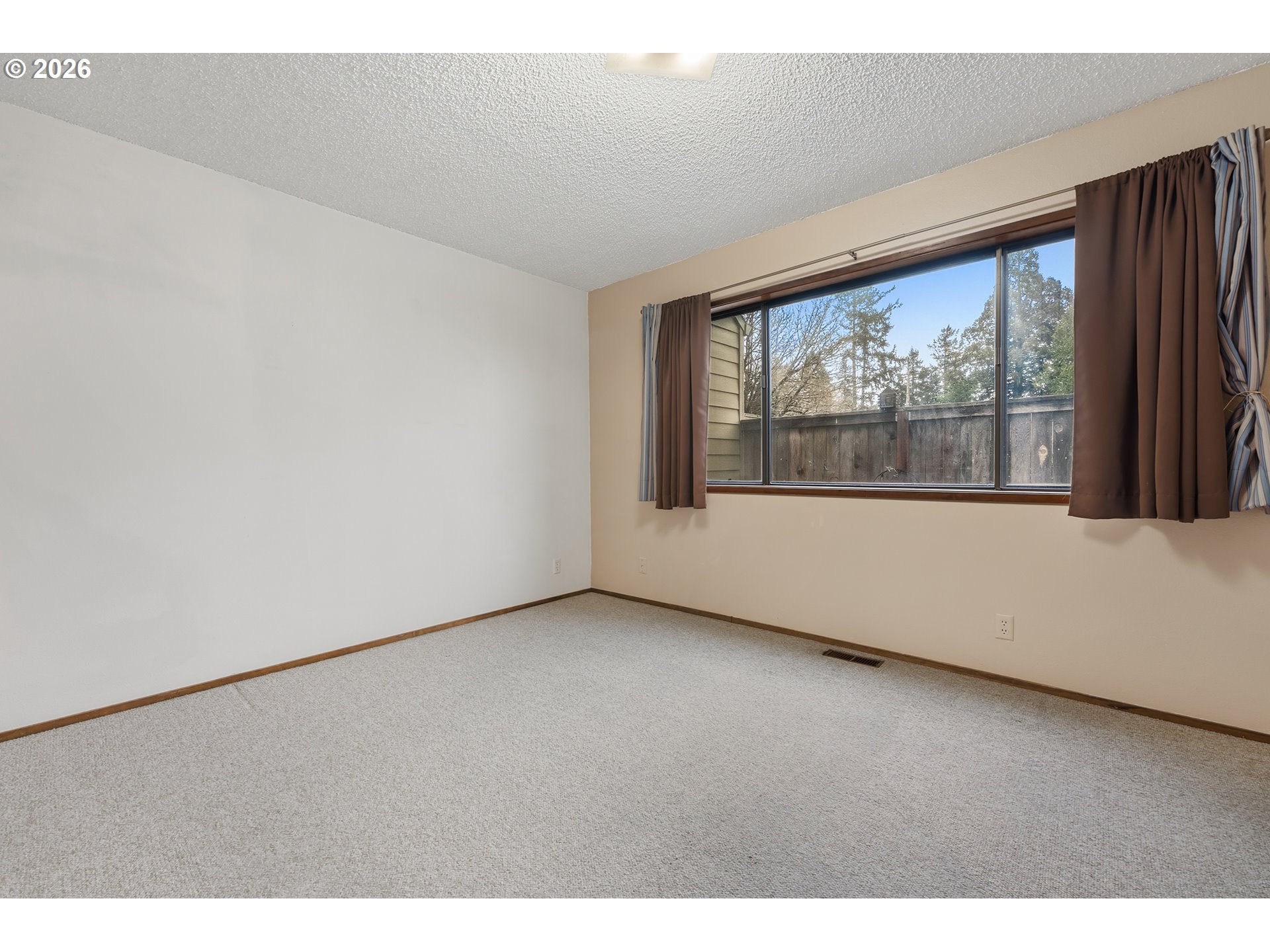 14807 Southwest 106th Avenue Portland, OR 97224 - Photo 15 of 37 a view of a room with a large window