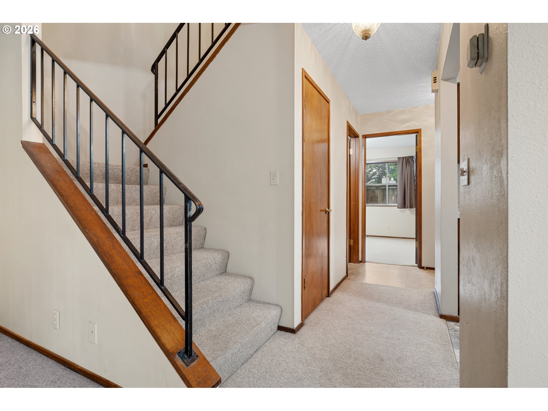 14807 Southwest 106th Avenue Portland, OR 97224 - Photo 20 of 37 a view interior of a house with wooden floor and windows