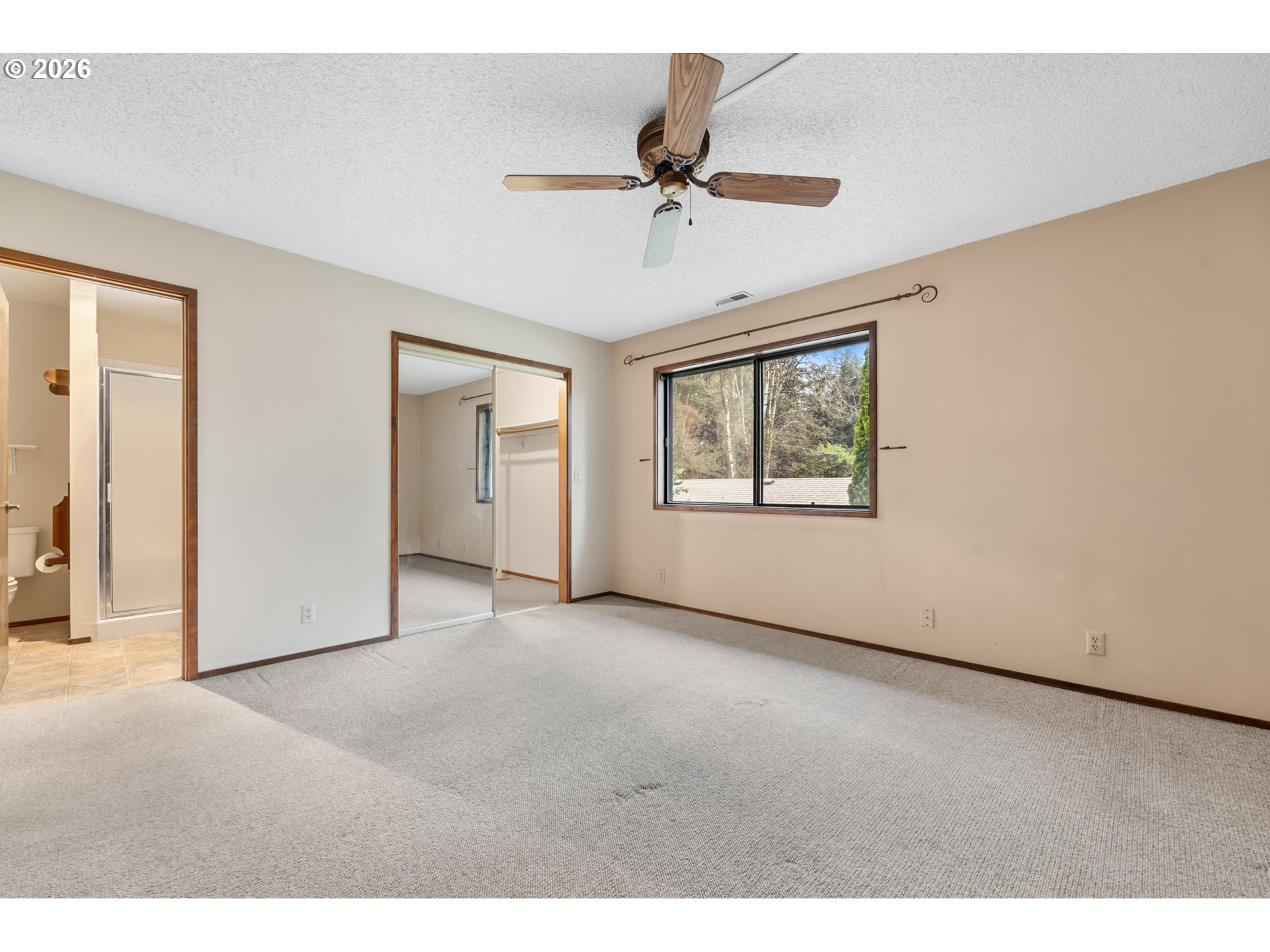 14807 Southwest 106th Avenue Portland, OR 97224 - Photo 25 of 37 a view of an empty room with a window