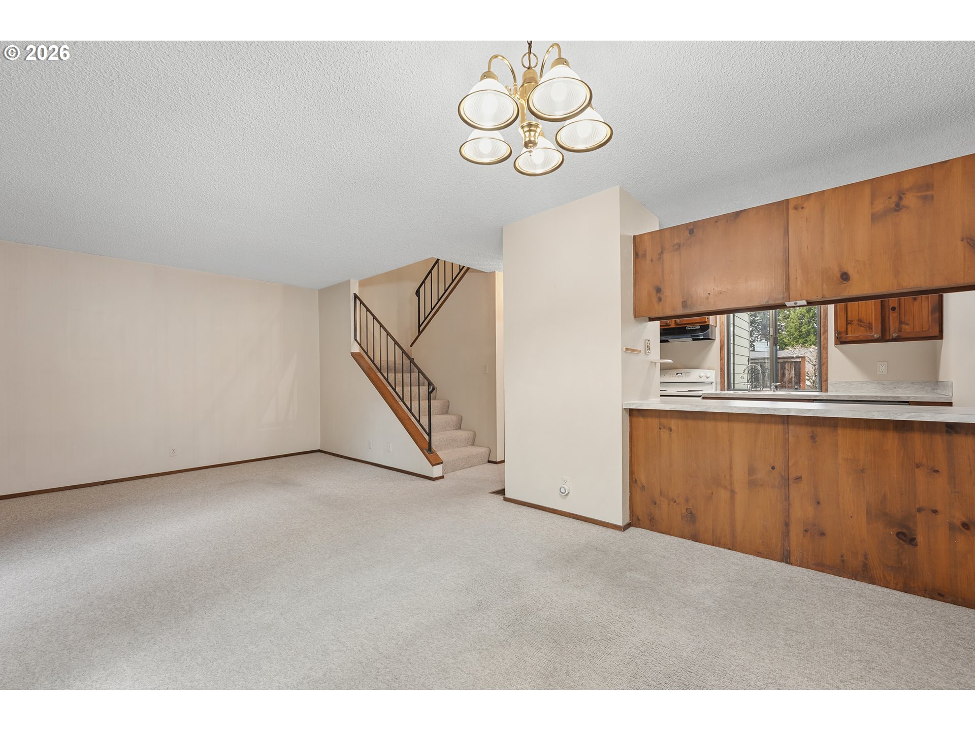 14807 Southwest 106th Avenue Portland, OR 97224 - Photo 7 of 37 a view of an empty room with a window