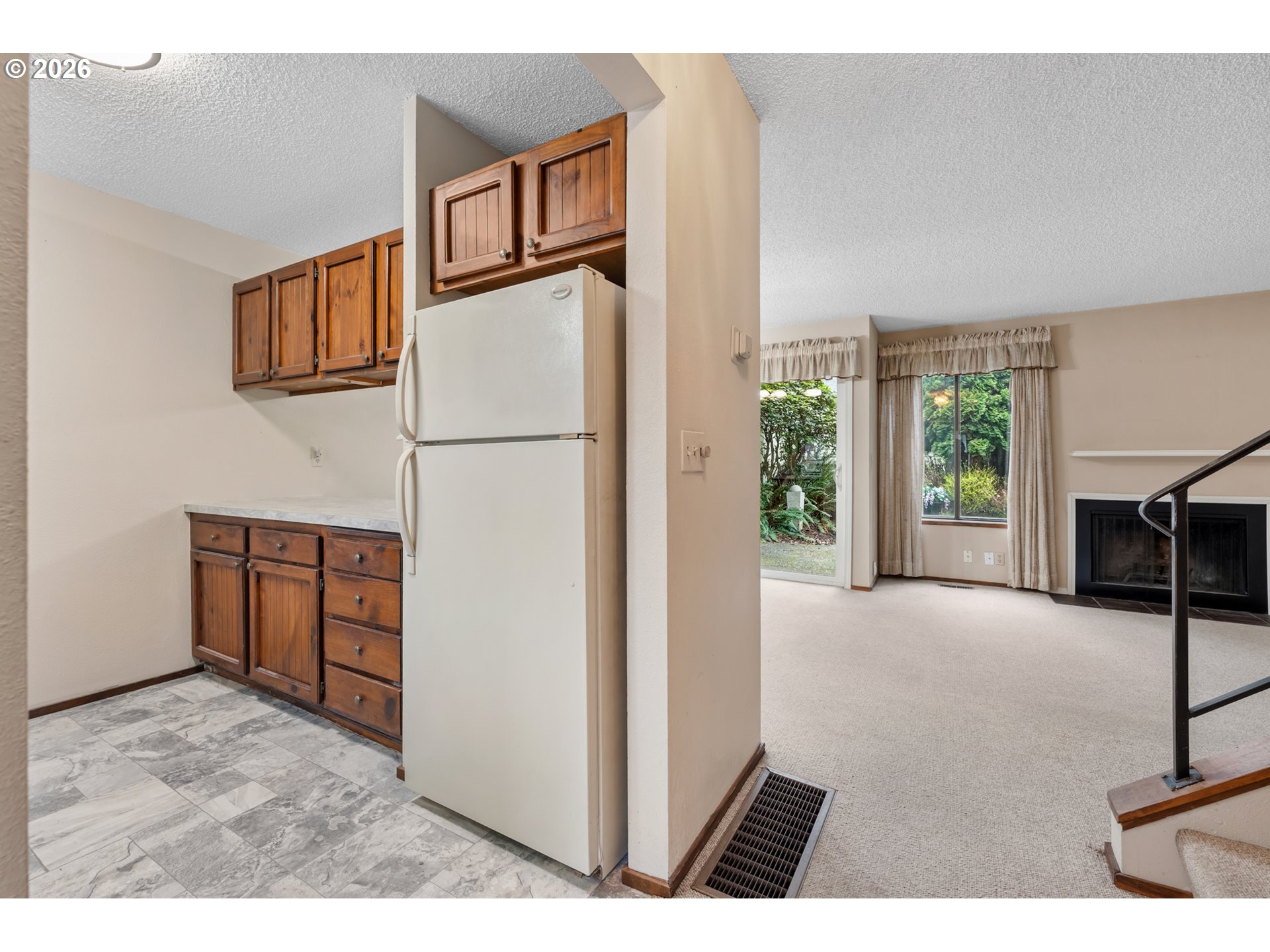 14807 Southwest 106th Avenue Portland, OR 97224 - Photo 9 of 37 a view of livingroom with furniture and a window