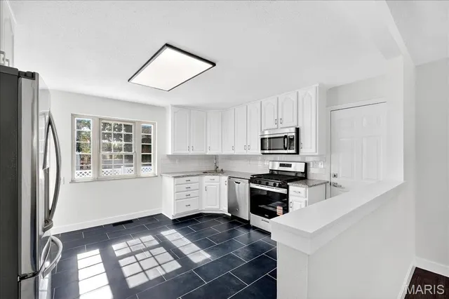 $199,500 | 1748 Spring Forest Lane, Hazelwood, MO 63042