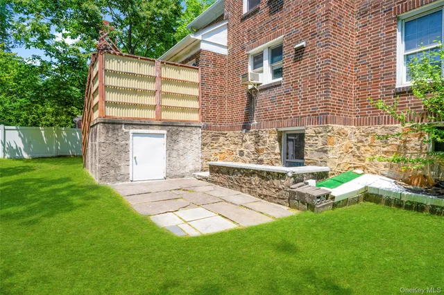 a view of outdoor space with garden and furniture