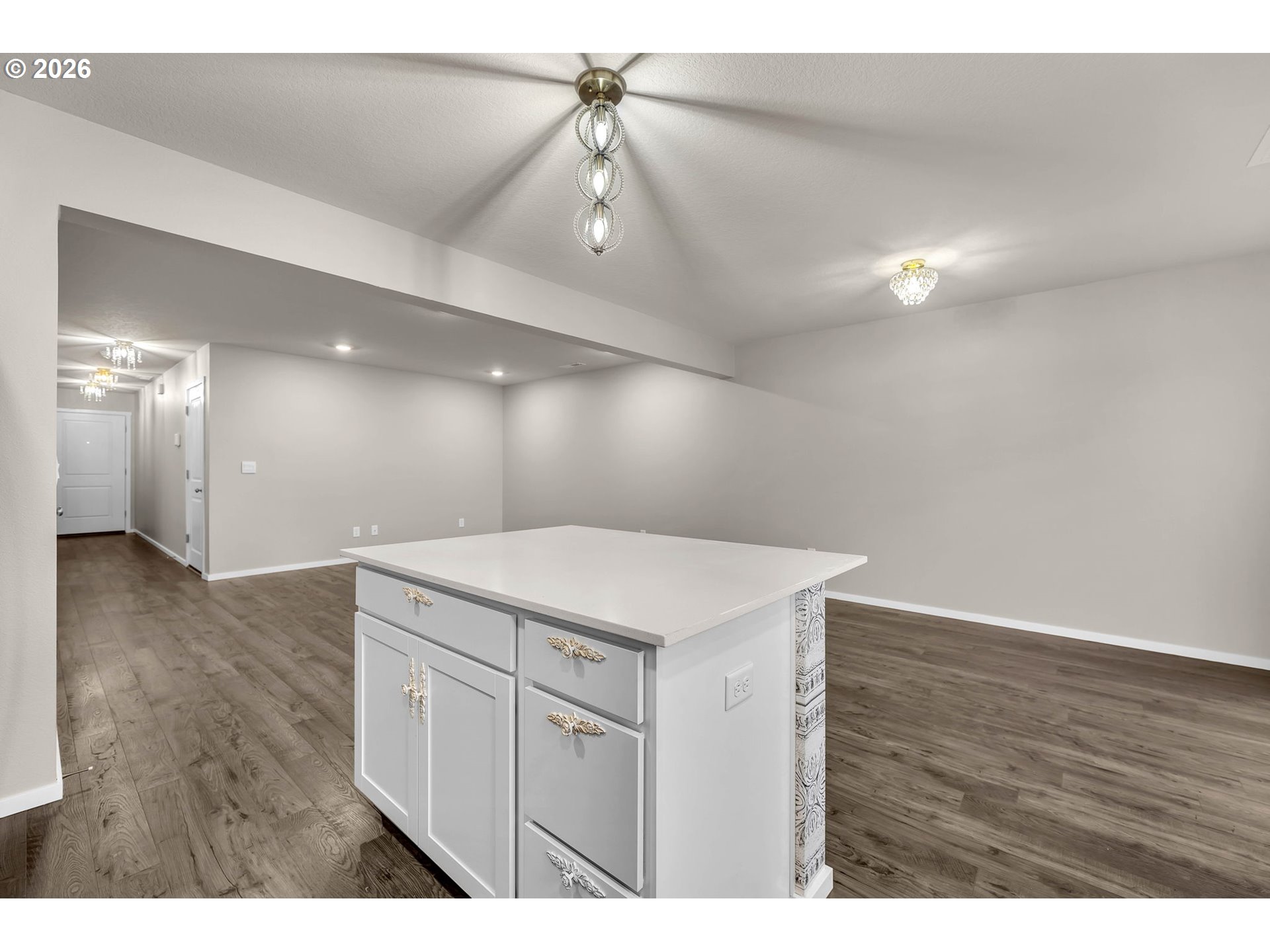 2933 North 3rd Way Ridgefield, WA 98642 - Photo 11 of 37 a kitchen with a wooden floor