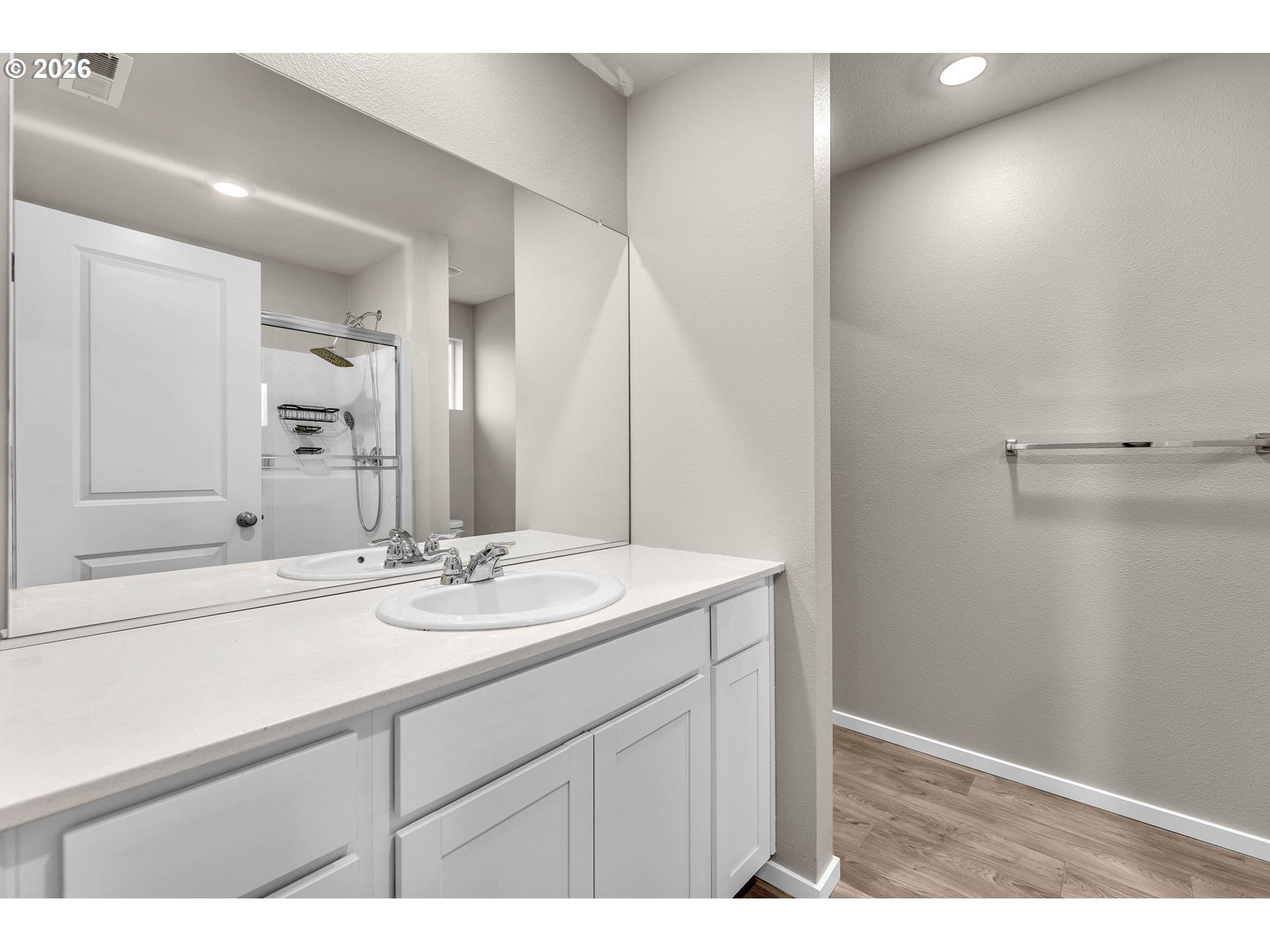 2933 North 3rd Way Ridgefield, WA 98642 - Photo 25 of 37 a bathroom with a sink and a mirror