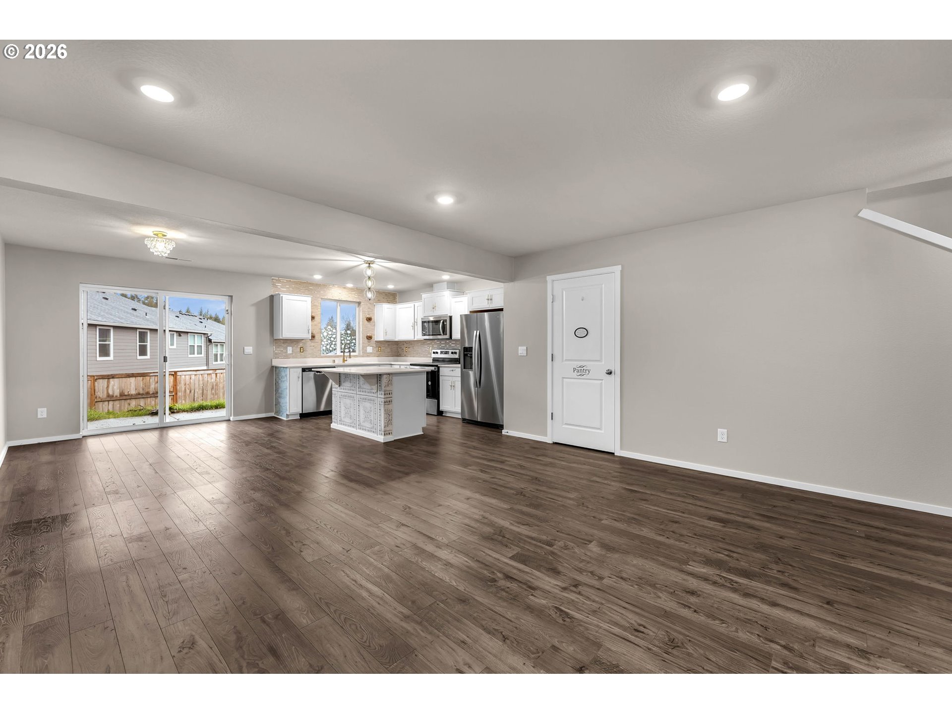 2933 North 3rd Way Ridgefield, WA 98642 - Photo 6 of 37 a view of empty room with wooden floor