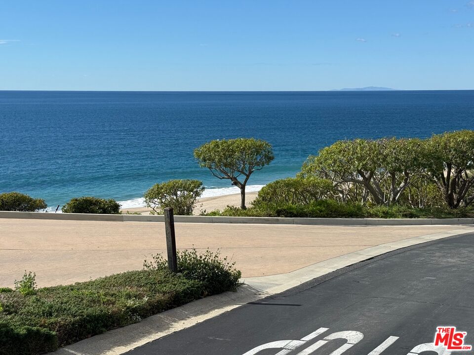 29500 Heathercliff Road, Unit 170 Malibu, CA 90265 - Photo 2 of 38 a view of a street with an ocean view