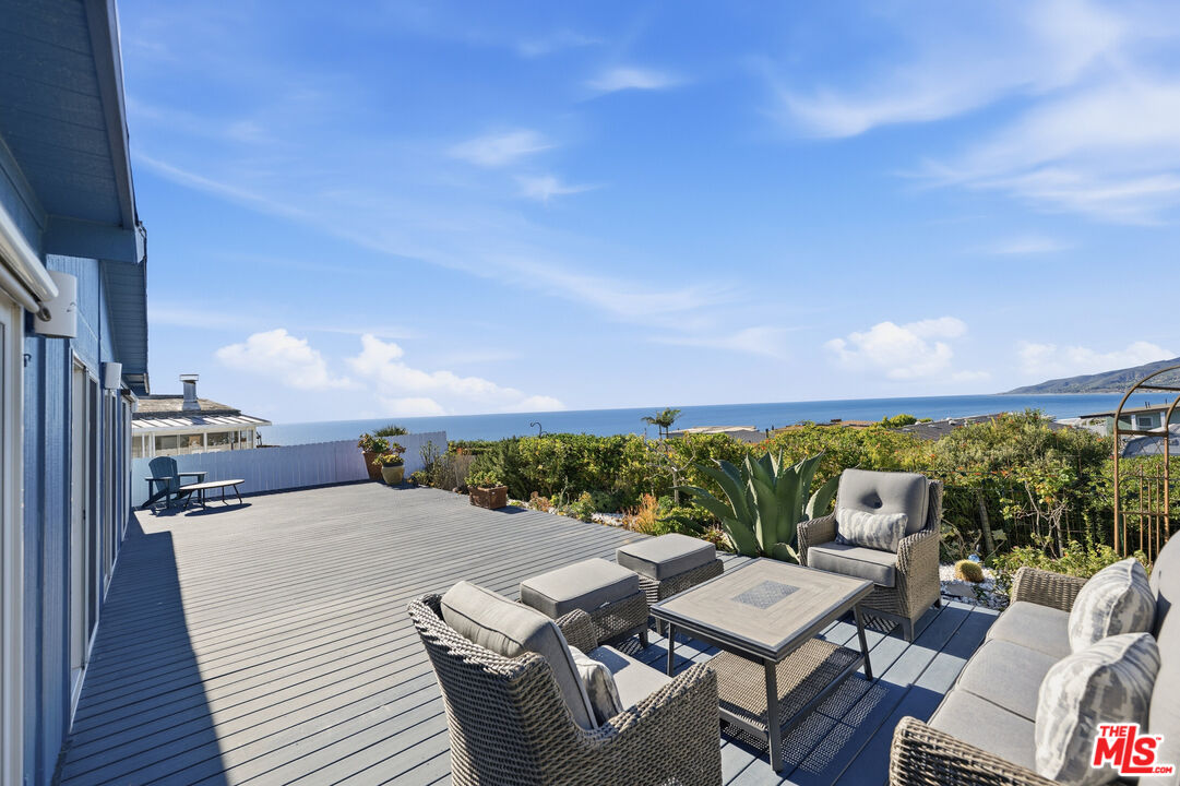29500 Heathercliff Road, Unit 170 Malibu, CA 90265 - Photo 23 of 38 a view of a terrace with couches
