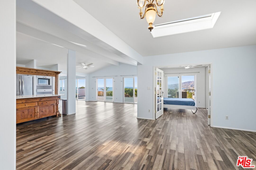 29500 Heathercliff Road, Unit 170 Malibu, CA 90265 - Photo 8 of 38 a view of an entryway with wooden floors