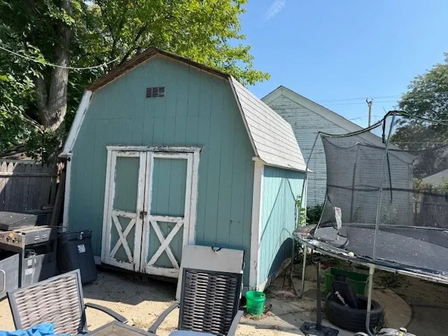 a house view with a backyard space