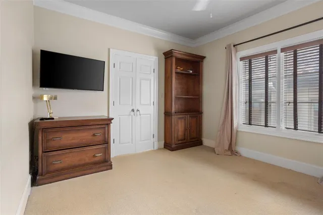 a room with furniture and flat screen tv