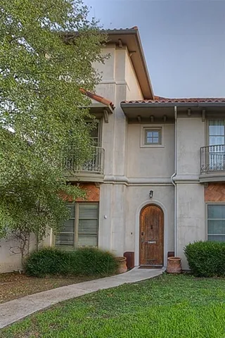a house view with a garden space