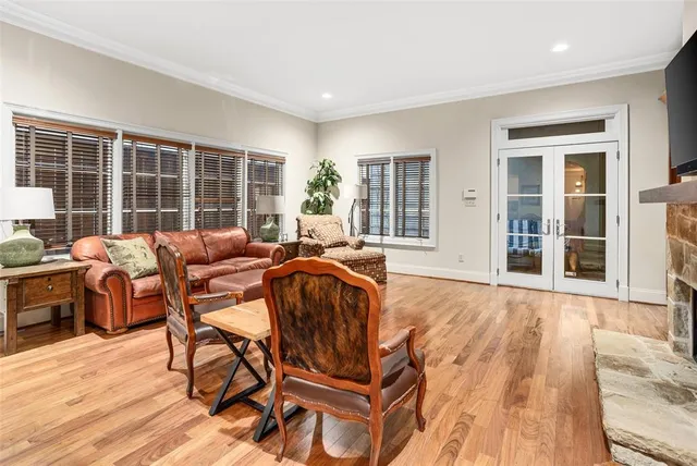 a living room with furniture and windows