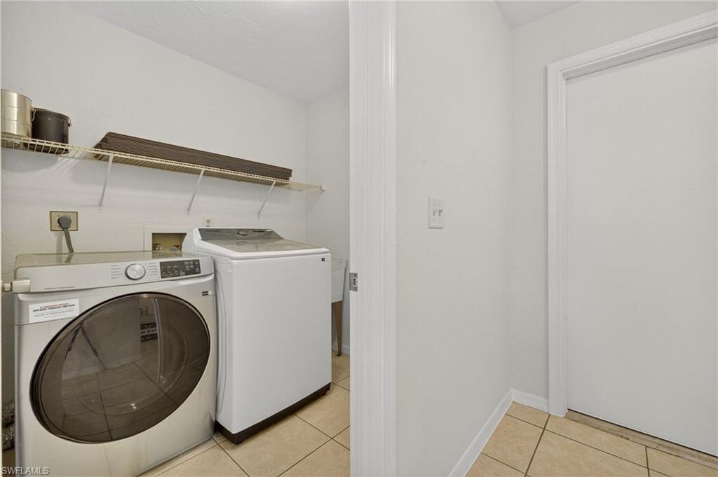 18294 Lee Road Fort Myers, FL 33967 - Photo 27 of 37 a utility room with dryer and washer