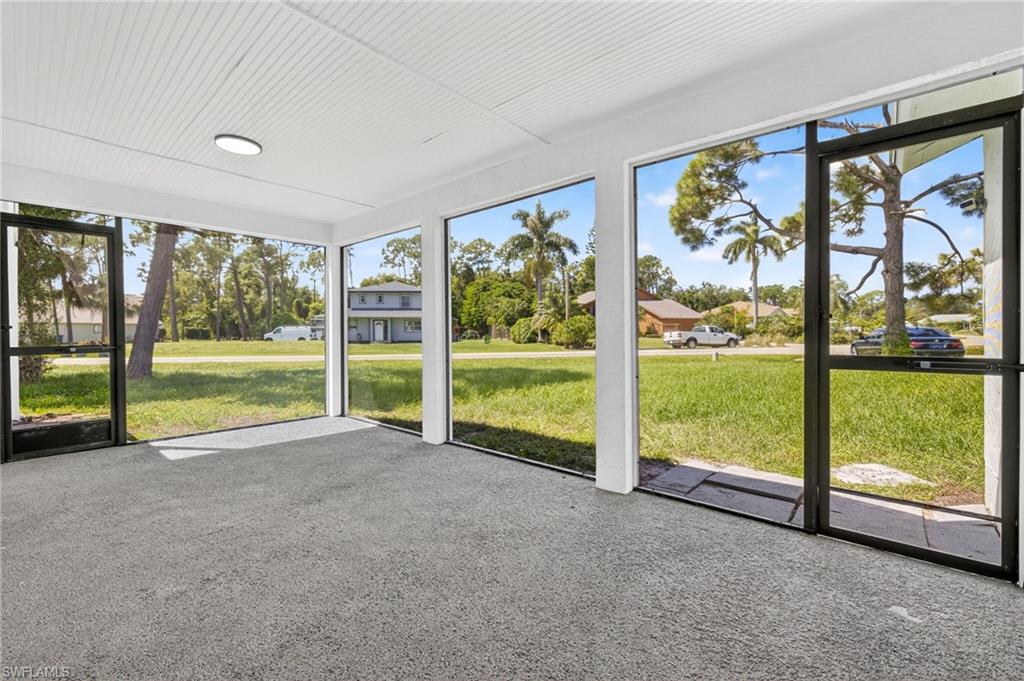 18294 Lee Road Fort Myers, FL 33967 - Photo 28 of 37 a view of an room with large windows