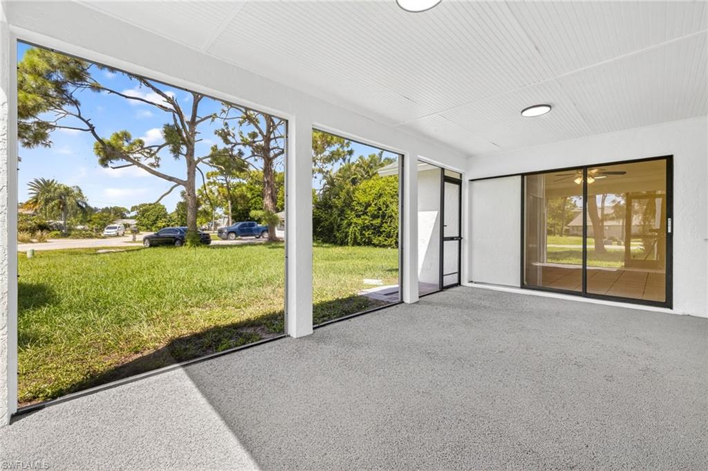 18294 Lee Road Fort Myers, FL 33967 - Photo 29 of 37 a view of an empty room with a large window
