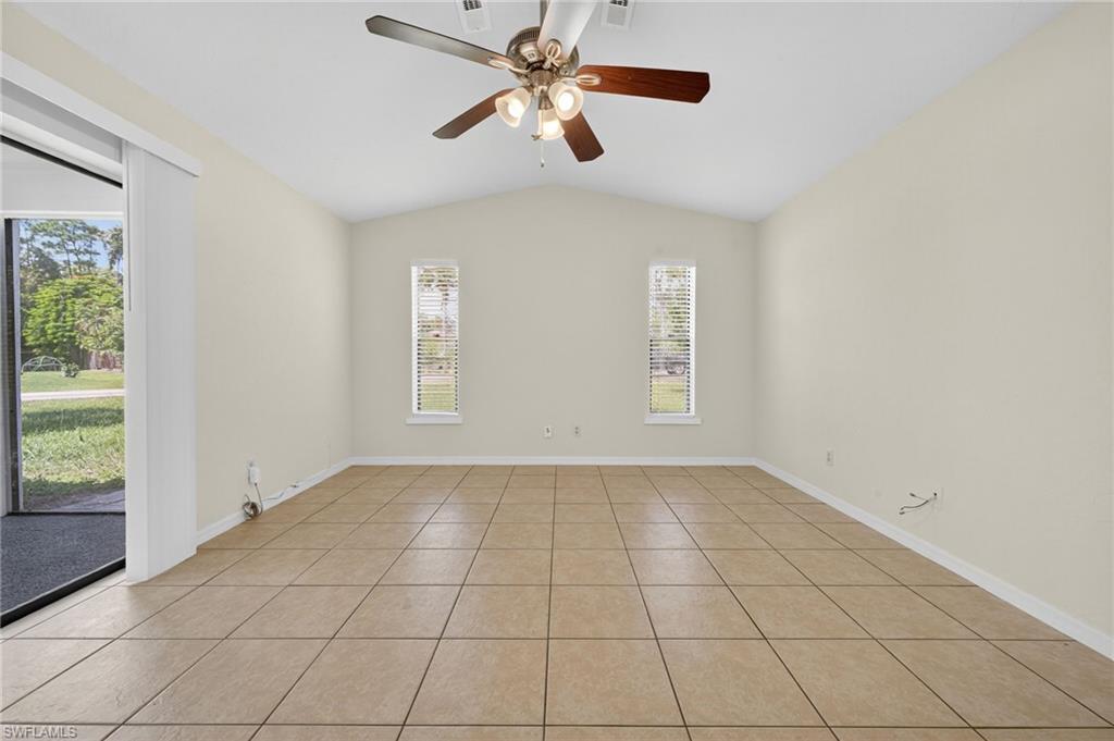 18294 Lee Road Fort Myers, FL 33967 - Photo 10 of 37 a view of an empty room with a window