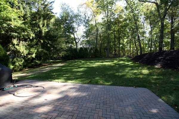 40 Hamilton Road Waltham, MA 02453 - Photo 30 of 30 a backyard of a house with lots of green space