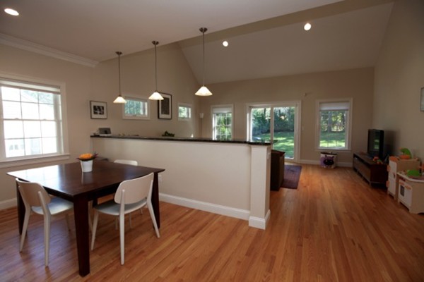 40 Hamilton Road Waltham, MA 02453 - Photo 7 of 30 a kitchen with a table and chairs in it