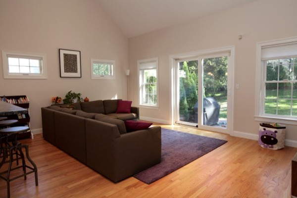 40 Hamilton Road Waltham, MA 02453 - Photo 8 of 30 a living room with furniture and a large window