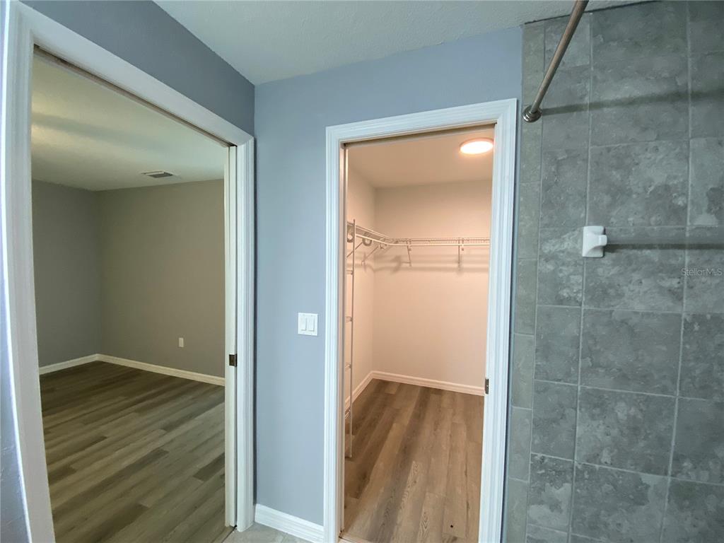 2827 Southwest 140th Loop Ocala, FL 34473 - Photo 16 of 29 wooden floor in a gallery