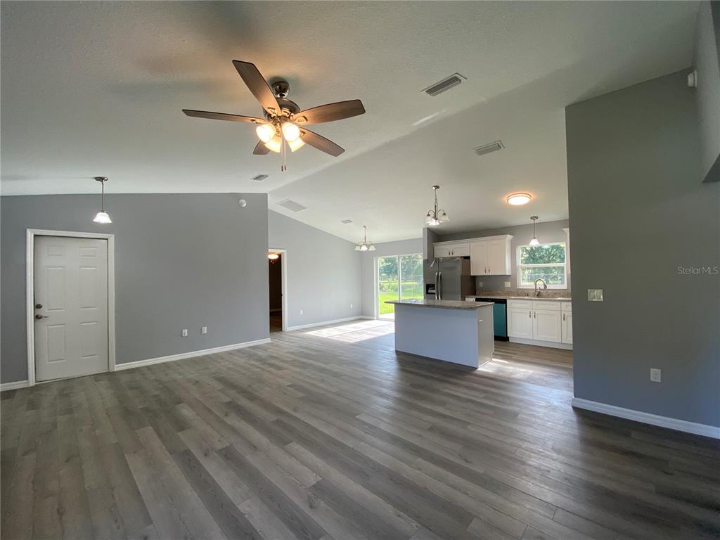 2827 Southwest 140th Loop Ocala, FL 34473 - Photo 5 of 29 a view of an empty room and kitchen view