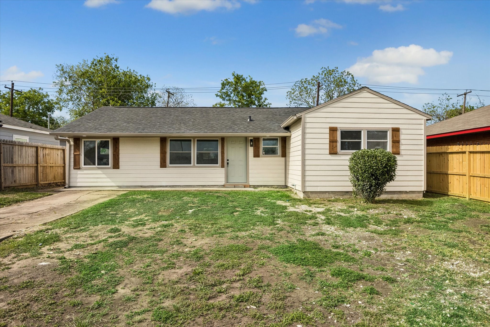 4203 Mowery Road Houston, TX 77047 - Photo 2 of 16 a view of a house with a yard