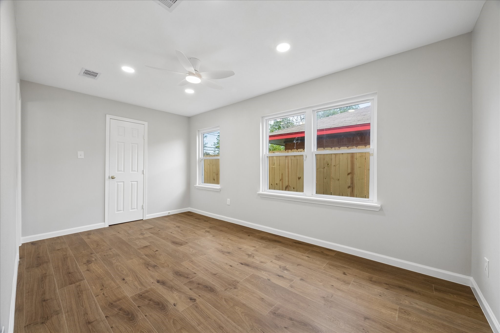 4203 Mowery Road Houston, TX 77047 - Photo 8 of 16 an empty room with windows