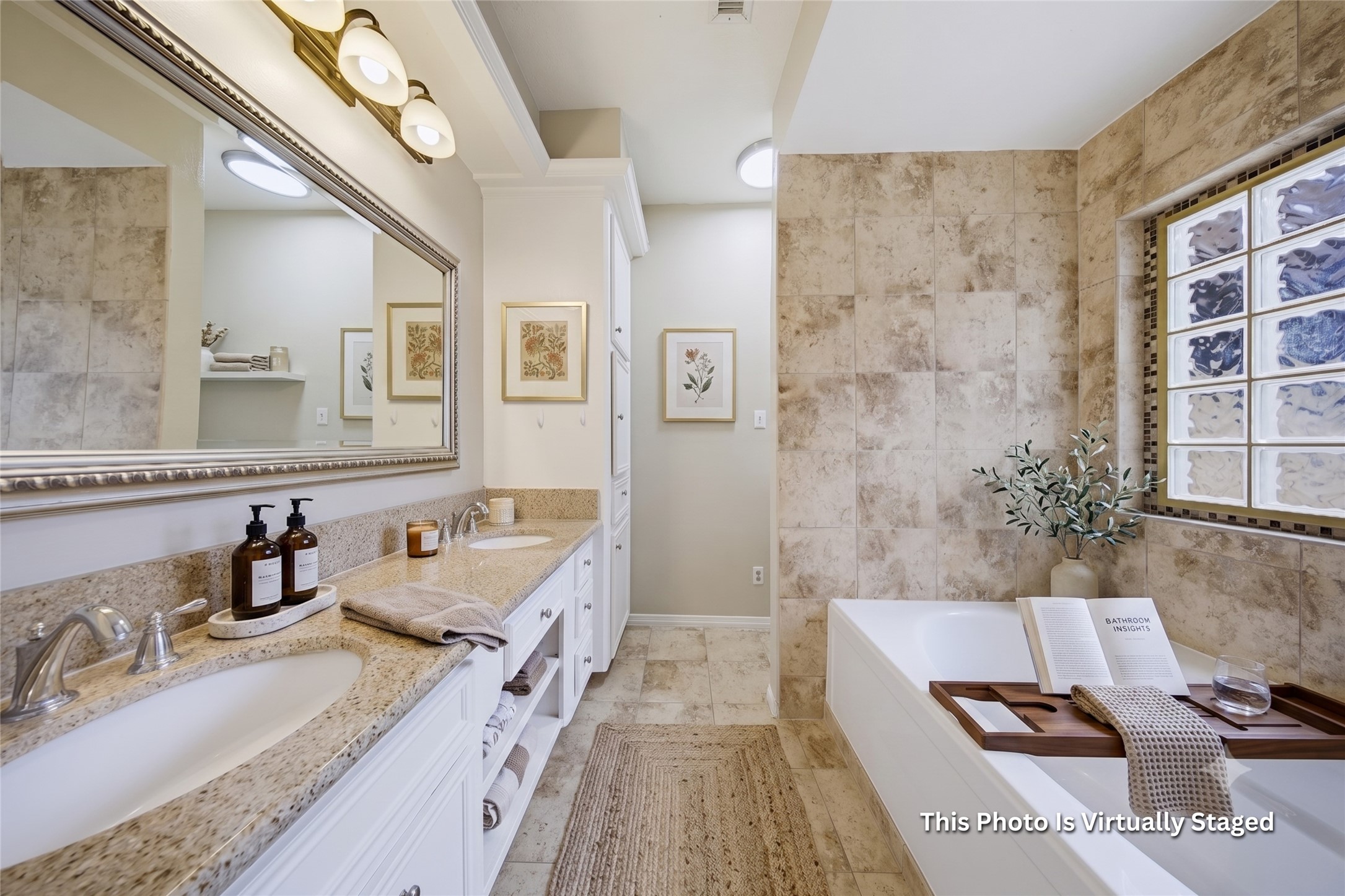 727 Bunker Hill Road, Unit 34 Houston, TX 77024 - Photo 5 of 38 the ensuite bath features a glass block window and an overall classic design fit for your daily needs.