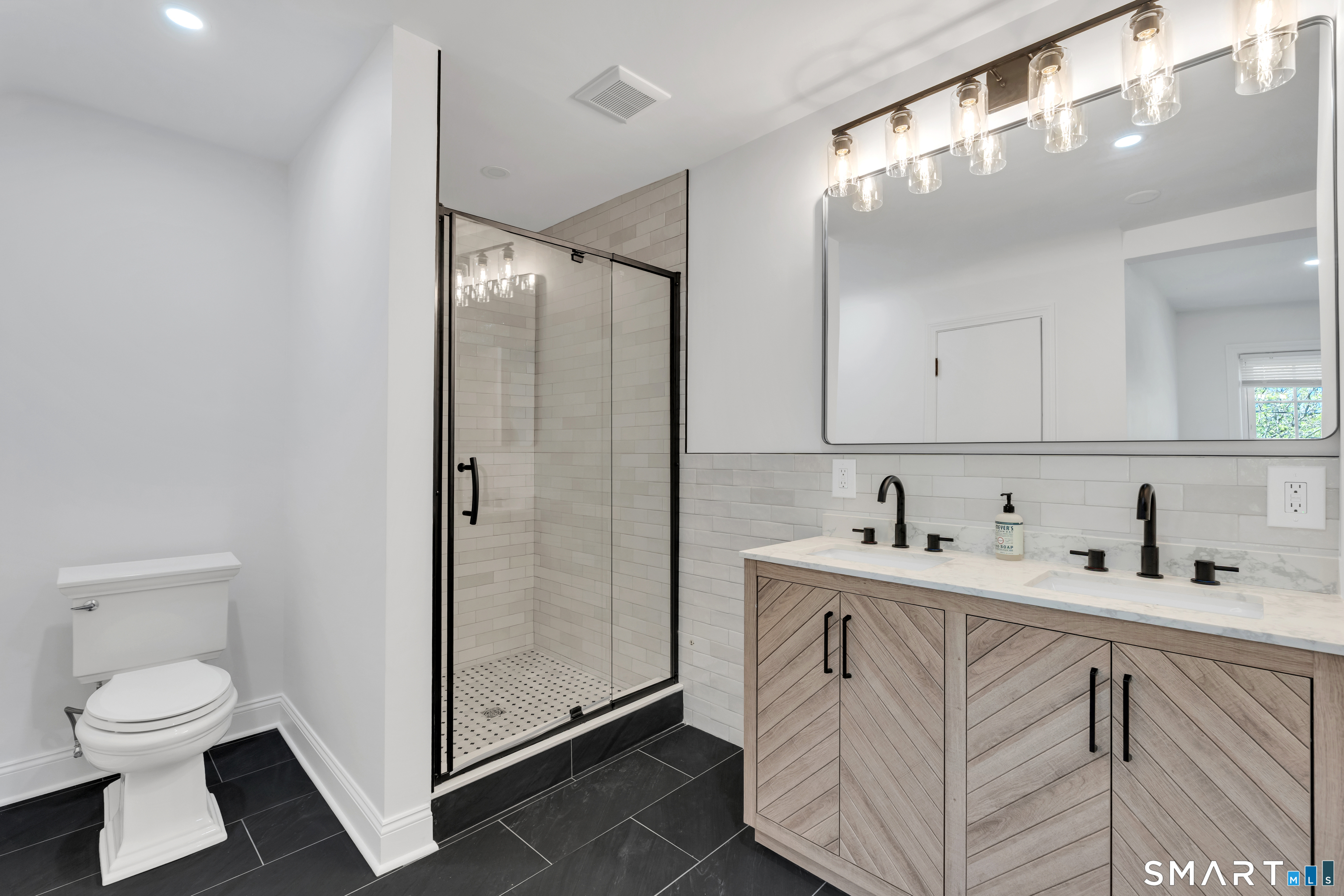 62 Edgewood Way New Haven, CT 06515 - Photo 20 of 39 Updated primary bath - new shower stall & vanity + another closet