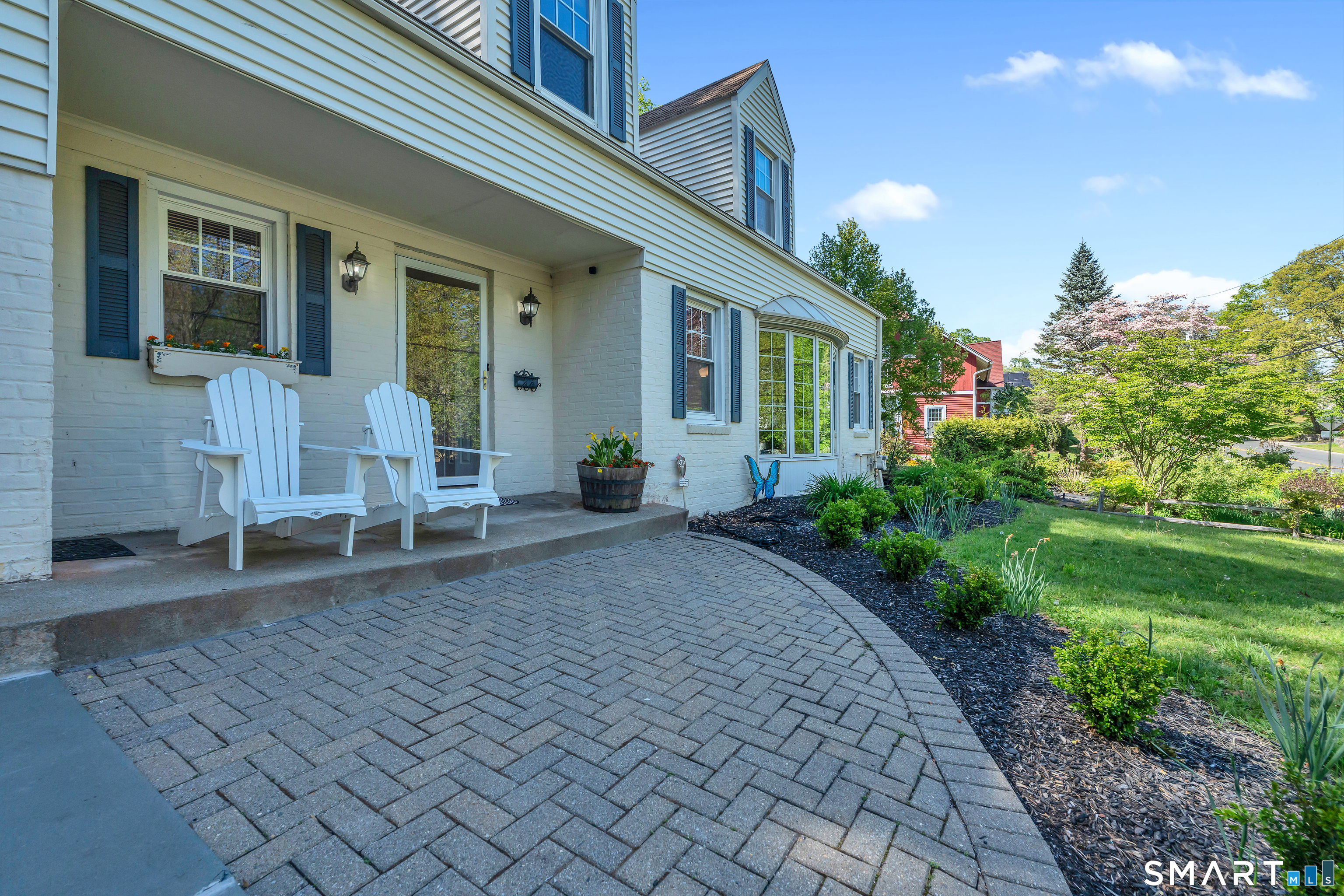 62 Edgewood Way New Haven, CT 06515 - Photo 2 of 39 Past 2-car attached garage, a generous front patio & porch