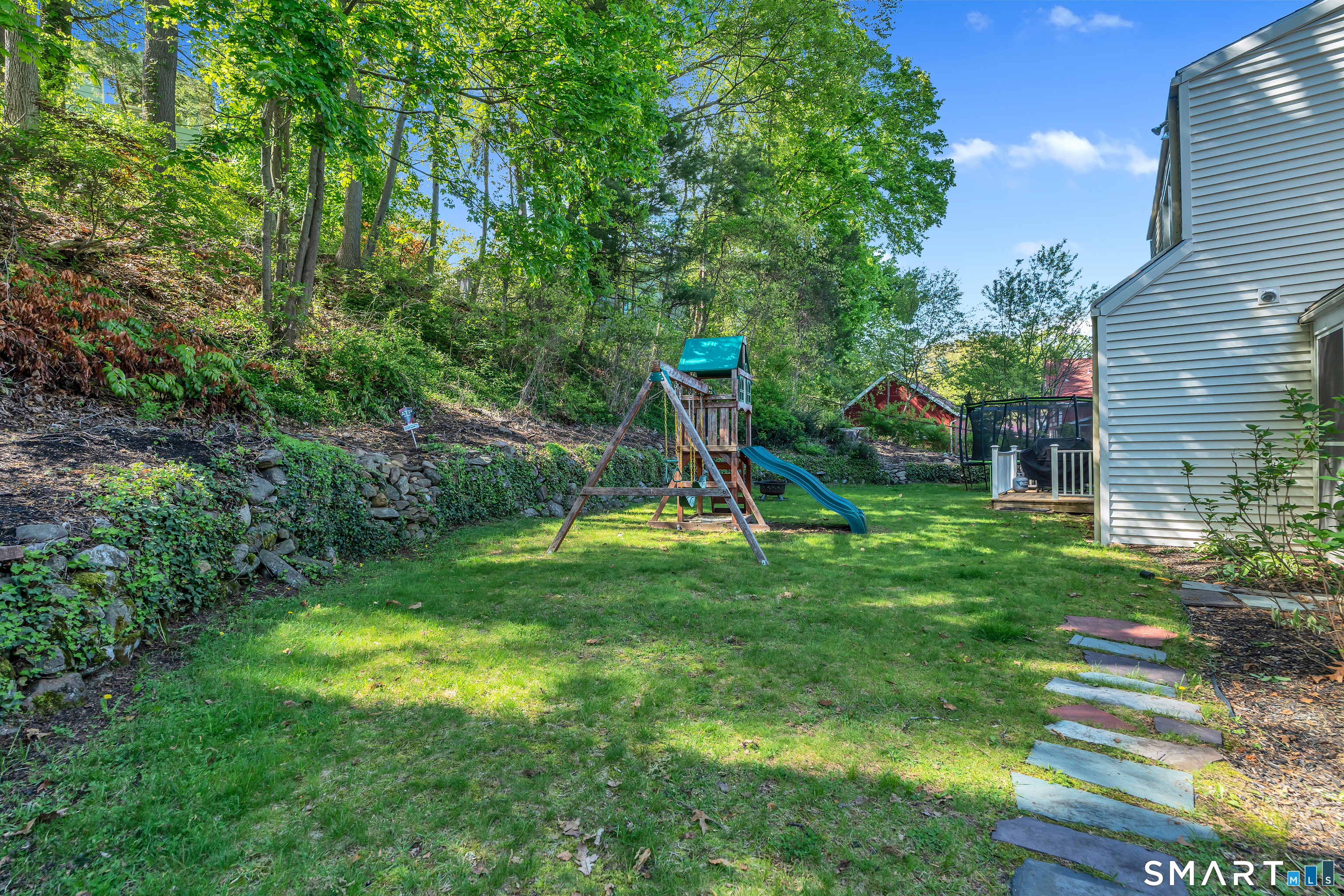 62 Edgewood Way New Haven, CT 06515 - Photo 36 of 39 Level backyard backs onto private hill with many local plantings