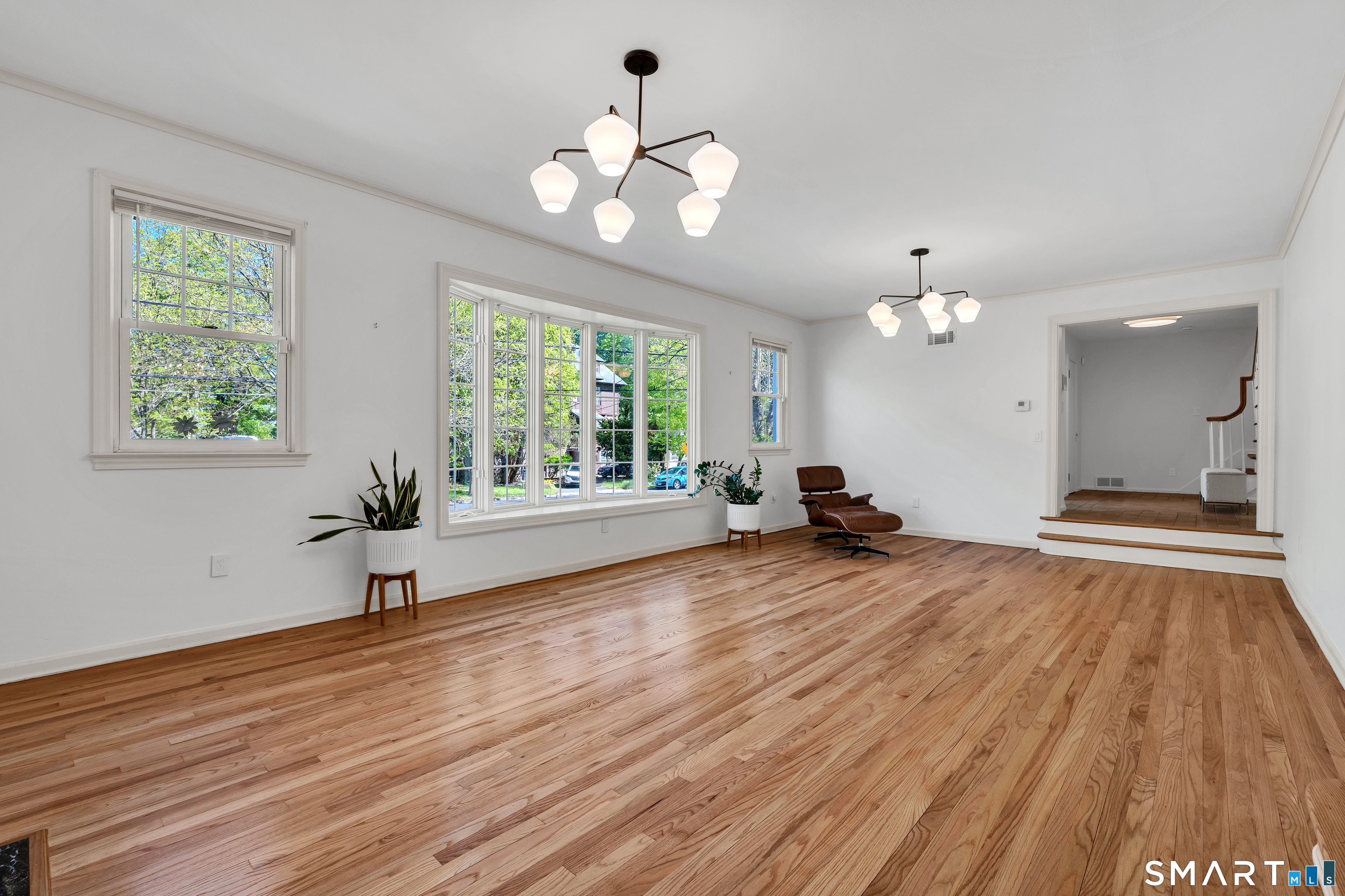 62 Edgewood Way New Haven, CT 06515 - Photo 4 of 39 Gorgeous sunken living room - West Elm lighting