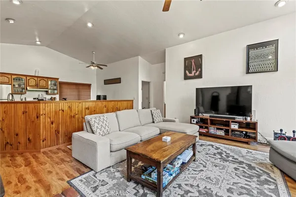 a bedroom with a bed and a couch