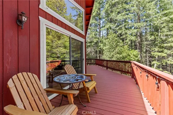 a backyard of a house with a tree