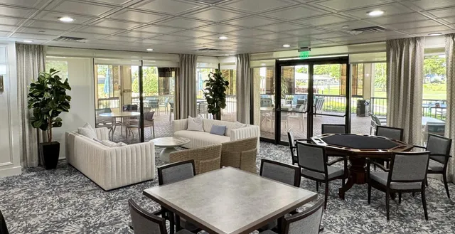 front view of a building with a garden