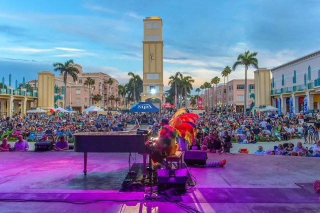 a view of swimming pool with outdoor seating