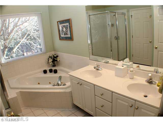 537 Barrett Road Winston-Salem, NC 27104 - Photo 9 of 16 Master Bath/Spa. Main level master bathroom has separate shower, double sinks, jetted tub