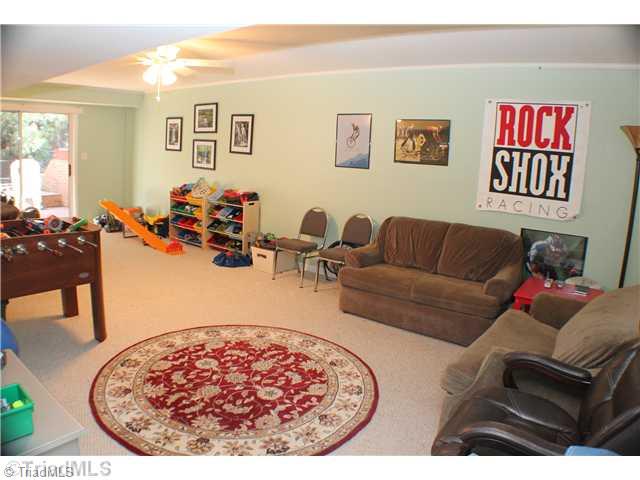 537 Barrett Road Winston-Salem, NC 27104 - Photo 11 of 16 Playroom. Large finished playroom in walkout basement