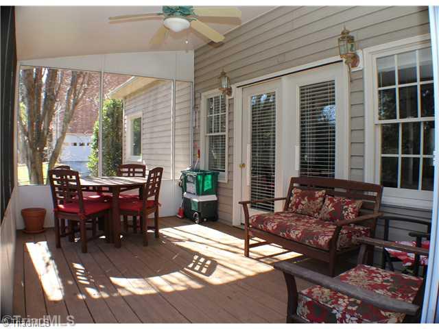 537 Barrett Road Winston-Salem, NC 27104 - Photo 13 of 16 Patio/Deck. Large screened porch overlooks fully fenced backyard, fire pit, multi-level deck -- great for entertaining!