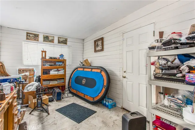 a view of a workspace with furniture